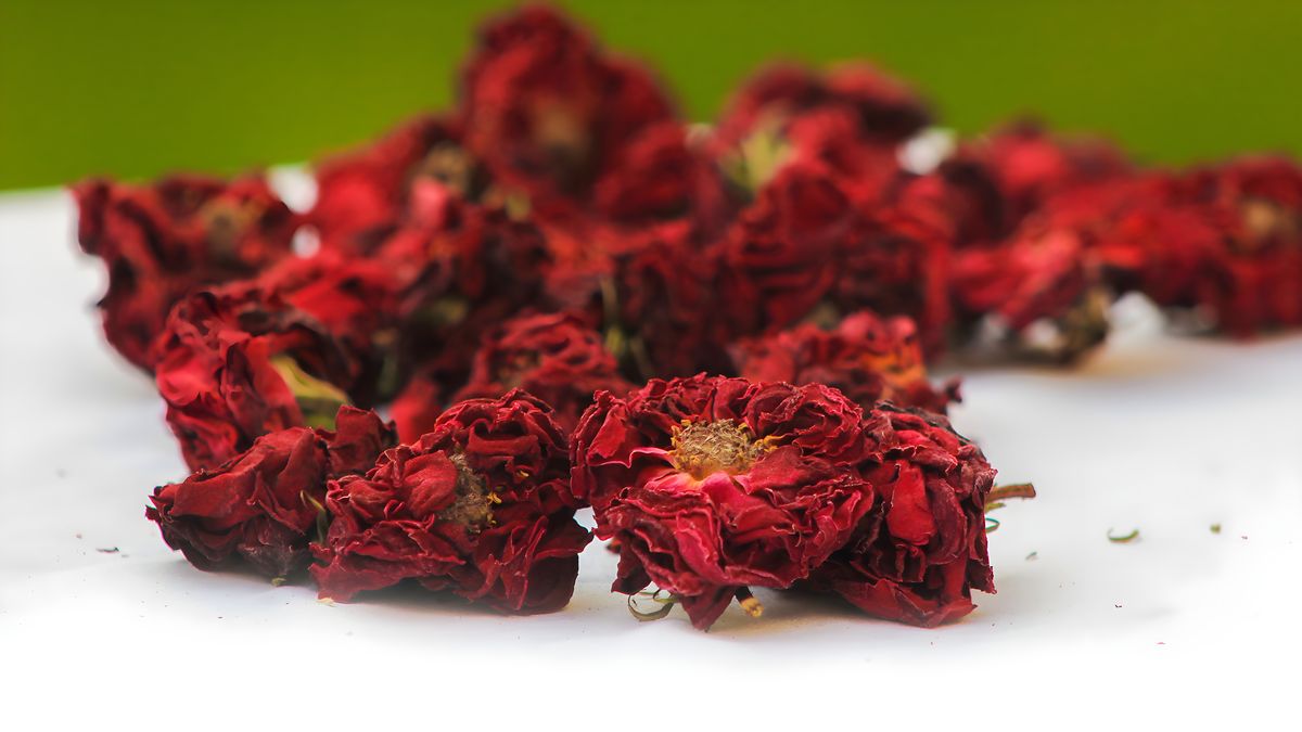 Event planner arranging wedding with dried rose petals